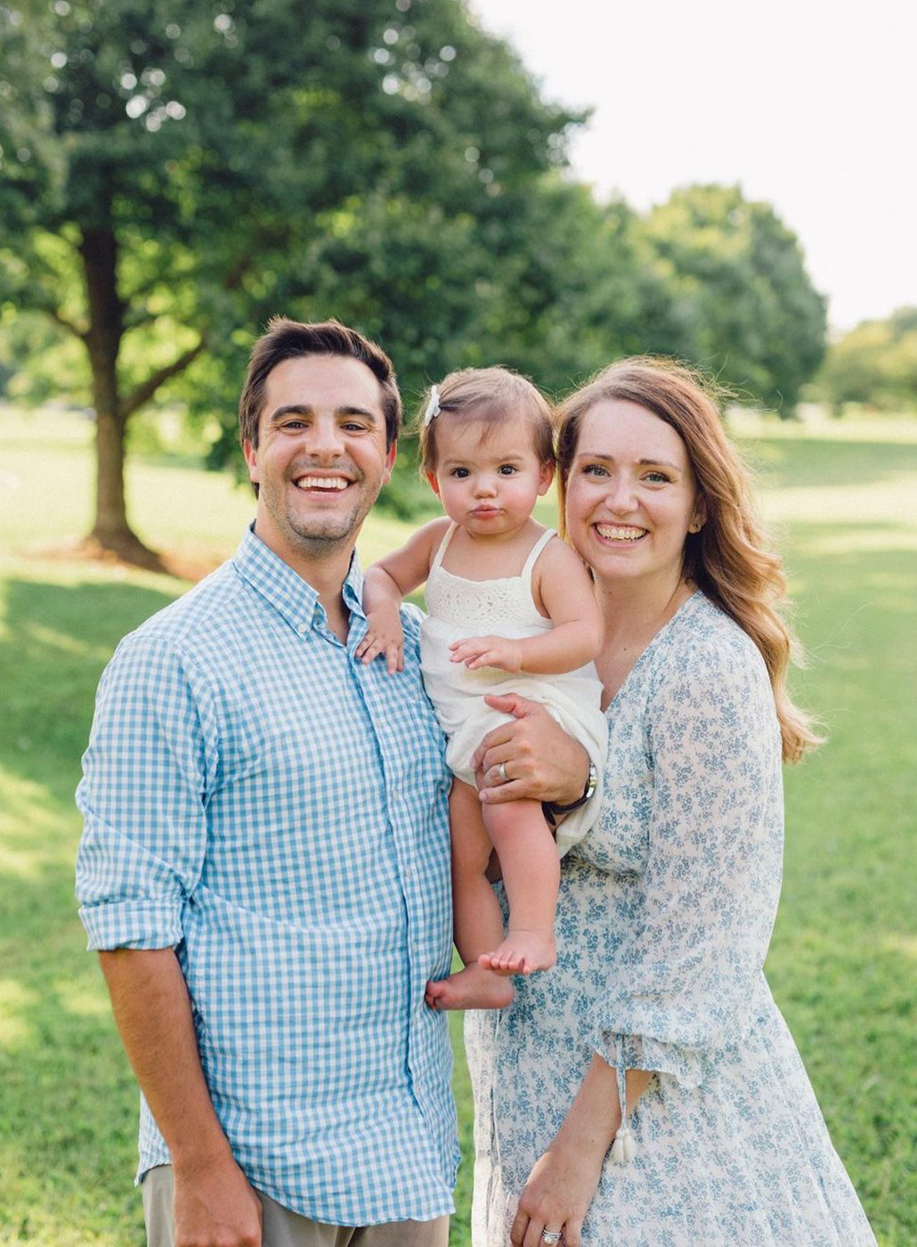 OneTrust Project Manager, Jennifer Shugh, posing for a family photo outside.